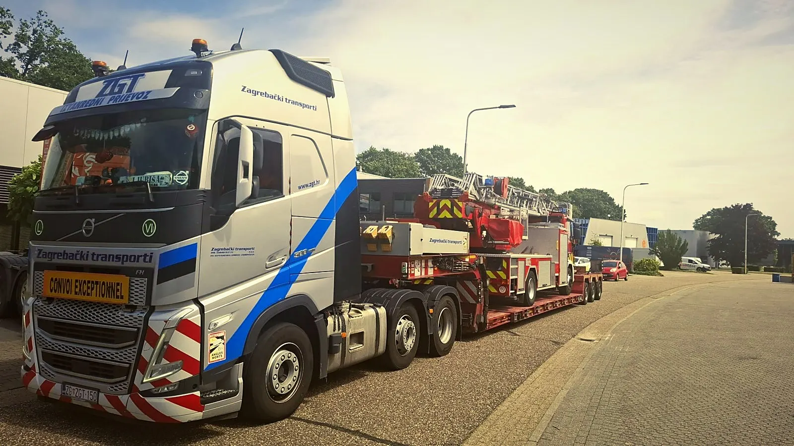 Heavy haulage truck carrying oversized cargo on a European highway